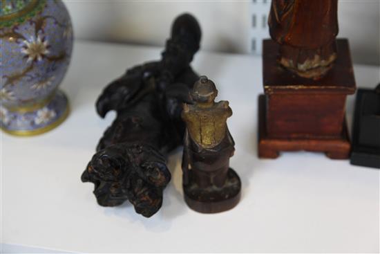 A Chinese gilt lacquered wood seated figure of Guandi, 18th / 19th century, and three other Chinese figures, all with some faults